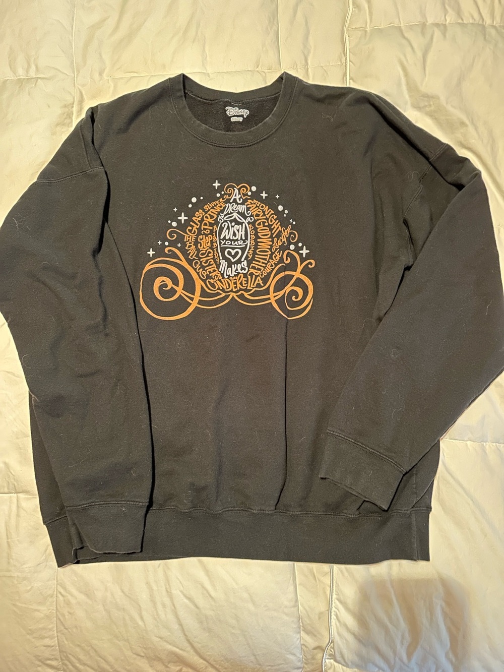 Disney  women’s Black Crewneck Sweatshirt with Orange Graphic